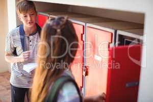 Students interacting with each other in locker room