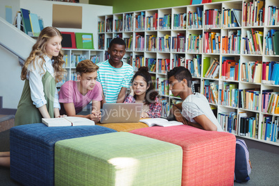 Attentive students studying in library