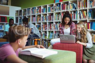 Group of students studying in library