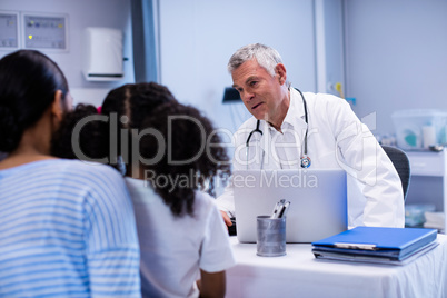 Doctor and patient interacting with each other