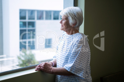 Senior patient standing at hospital