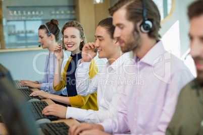 Customer service executives working in call center