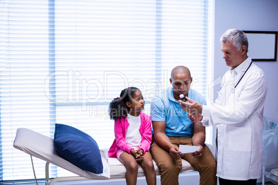 Doctor prescribing medicine to patient