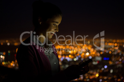 Business executive using mobile phone