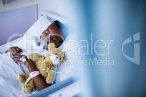 Patient wearing oxygen mask while sleeping