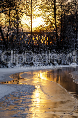 Sunset on the river in winter