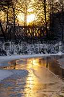 Sunset on the river in winter