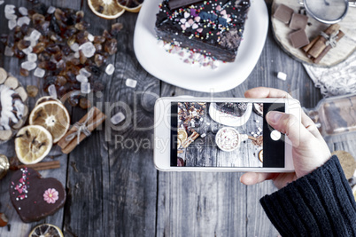 process of photographing the smartphone table with food and drin