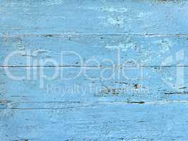 old wooden boards painted in blue color as the background