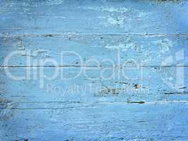 old wooden boards painted in blue color as the background