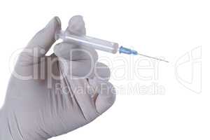 Hand in latex glove with syringe