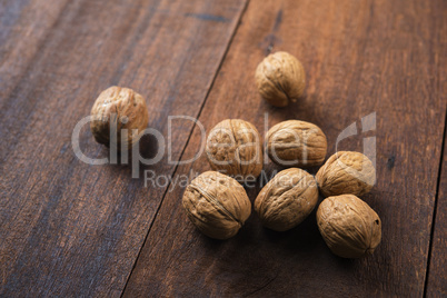 Walnuts shell on wooden table
