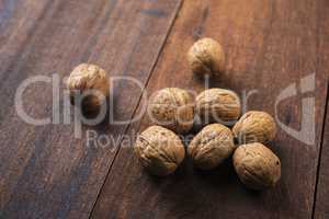 Walnuts shell on wooden table