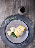 Fried cod fillets and spinach