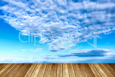 White cumulus clouds over the lake