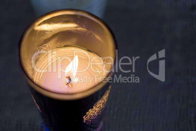 one burning candle