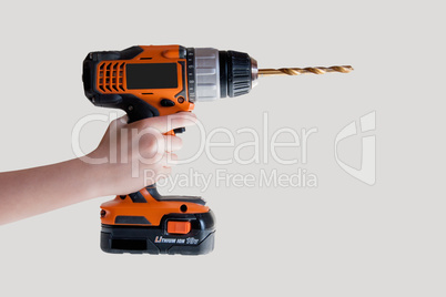 Electric drill with a drill for metal