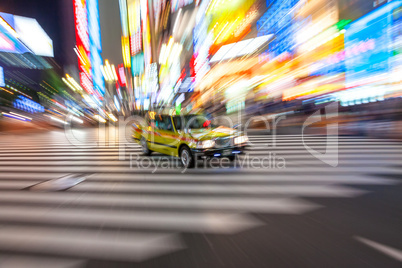 Motion Blurred Taxi on Crossing, Shibuya, Tokyo, Japan