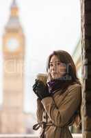 Woman Drinking Coffee by Westminster Bridge, Big Ben, London, En