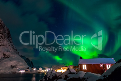 Northern Lights over Norwegian Houses