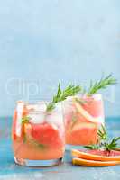 Grapefruit and rosemary gin cocktail, refreshing drink with ice