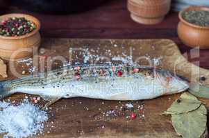 Fresh smelt fish in spices for cooking