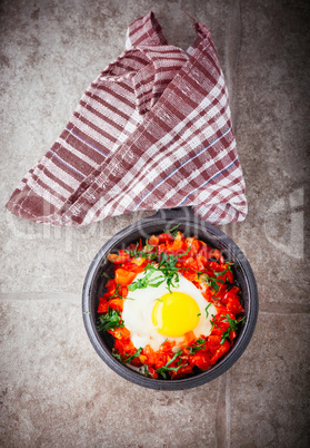 Traditional Middle Eastern dish of Shakshuka in a pan.