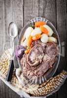 Pot-Au-Feu - French beef stew with a spoon and knife.