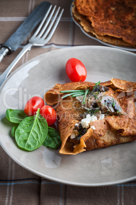 Homemade french buckwheat galette on the table.