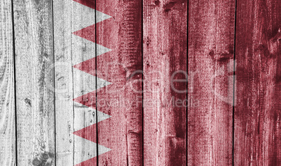 Fahne von Bahrein auf verwittertem Holz