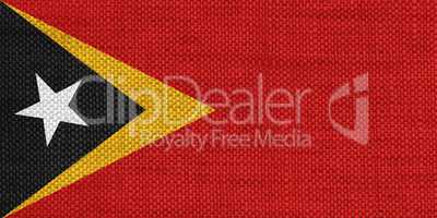 Fahne von Osttimor auf altem Leinen