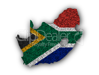 Karte und Fahne von Südafrika auf Mohn