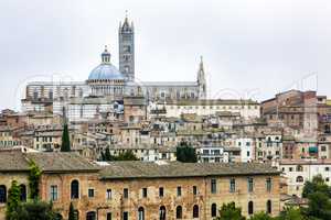 Cityscape with Duomo of Siena in Tuscany