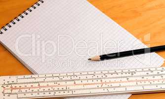 Pencil ruler and notebook