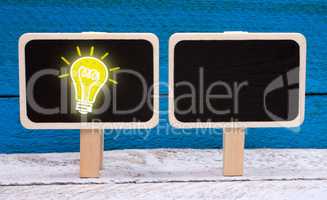 Idea and Innovation - chalkboard with light bulb and copy space