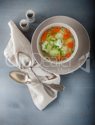 Chicken soup with meatballs and vegetables
