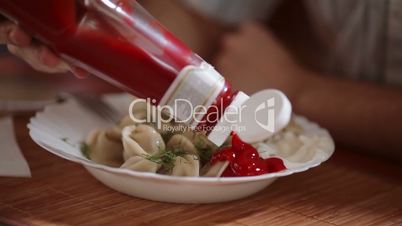 Dumplings and a bottle of ketchup