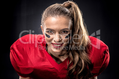 Female american football player in uniform
