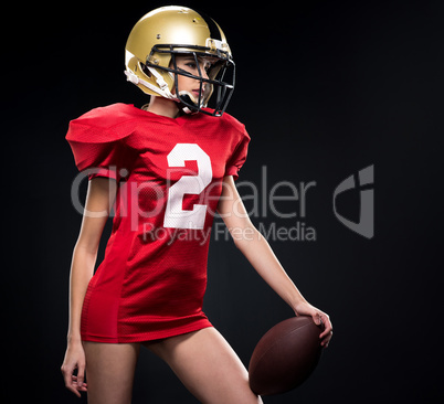 Female american football player in sportswear