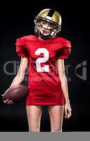 Female football player in helmet