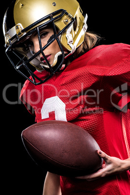 Female american football player in sportswear