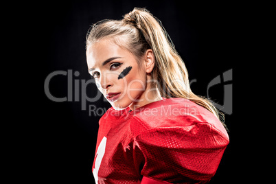 Attractive female american football player