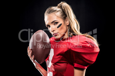 Female football player with ball