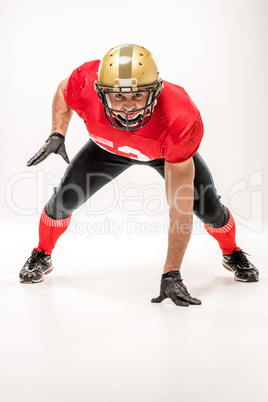 Football player in protective sportswear