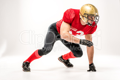 Football player in protective sportswear