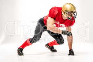 Football player in protective sportswear