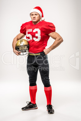 Football player in santa hat