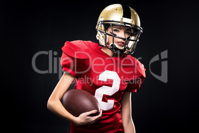 Female american football player in sportswear