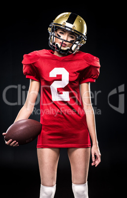 Female football player in helmet
