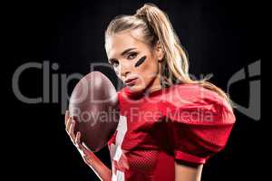 Female football player with ball